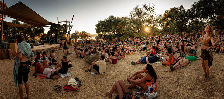 lifestyle advertising photographer | fesitval crowd watching show at boom  festival portugal